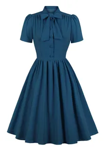 Elegant vintage dark blue midi dress with pussy-bow tie and pleated skirt design