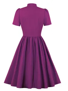 Back view of elegant purple A-line dress with short sleeves and high neck collar