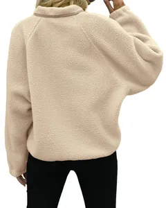 Back view of plush cream fleece pullover jacket showing soft texture and cozy fit