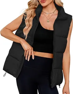 Close-up detail of women's black puffer vest with stand collar and zipper