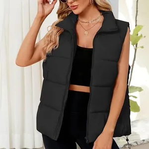 Close-up of a women's black quilted puffer vest with a warm stand collar design