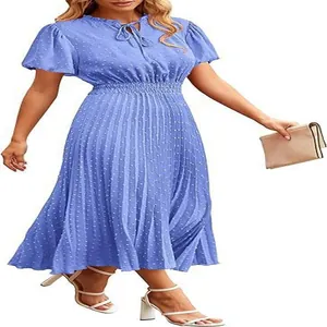 Detailed visual of the pleated Swiss dot fabric texture on a casual blue A-line midi dress