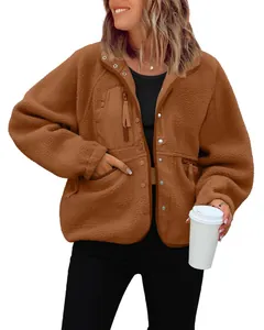 Casual women's brown sherpa fleece jacket featuring a chest zip pocket and snap buttons