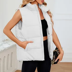 Close-up of white sleeveless quilted puffer vest with stand collar and zipper detail