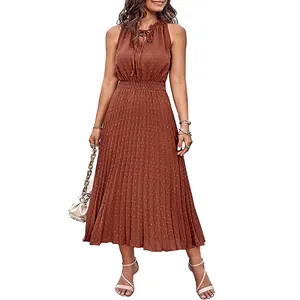 Elegant brown sleeveless Swiss dot pleated midi dress with ruffled tie neck and A-line hem
