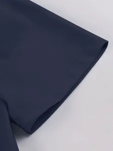 Close-up of navy blue chiffon dress sleeve showing detailed stitching and fabric texture