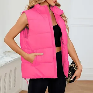 Stylish hot pink women's sleeveless puffer vest with stand collar and side pockets