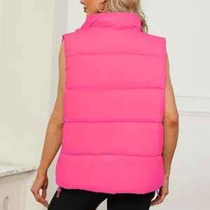 Back view of a vibrant pink sleeveless puffer vest with stand collar and quilted design