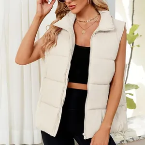 High-quality detailed shot of a women's cream stand-collar puffer vest with zipper
