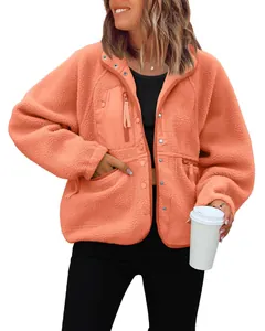 Soft peach fuzzy fleece jacket with snap buttons and zip pockets shown on model