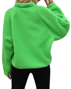Back view of a vibrant neon green fleece jacket with warm sherpa texture for women.