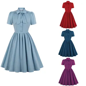 Retro short sleeve flared dress with elegant bow tie neck available in four classic colors