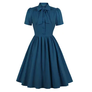 Elegant dark teal vintage dress with bow-tie neckline and pleated flared A-line skirt