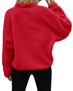 Back view of women's red fleece jacket showing soft sherpa texture and stitching