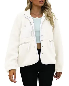 Close-up front detail view of a white sherpa fleece jacket for women with chest pockets