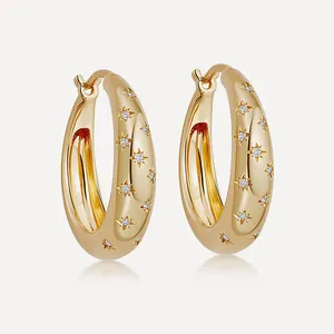 Gold S925 sterling silver hoop earrings with sparkly inlaid starburst star designs