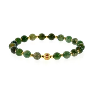 Detailed view of handmade green moss agate bracelet with golden filigree spacer bead