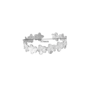 Detailed view of silver floral cuff bracelet showing 55mm inner diameter measurement