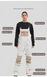 Detail view of professional women's ski bib pants showing functional design features