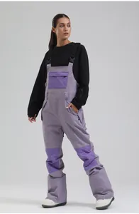 Full-length professional view of women's lavender waterproof ski bib overalls on a model