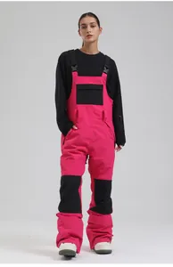 Waterproof women's pink ski bib overalls for winter outdoor sports