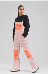 Professional pink and orange women's ski bib pants for winter snowboarding sports