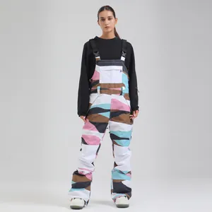 Professional waterproof camouflage print ski bib pants for women in outdoor snow sports.