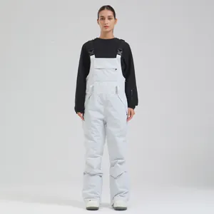 Professional women's white insulated ski bib pants with waterproof windproof design