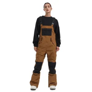 Women's professional waterproof ski bib in brown and black for winter outdoor sports