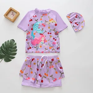 Girls purple mermaid and cherry print two-piece swimsuit set with matching swim cap