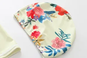 Close-up of vibrant floral pattern on kids' UV protection swim cap with premium stitching