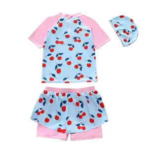 Three-piece sun-protective girl's swimsuit set with cherry print and matching cap