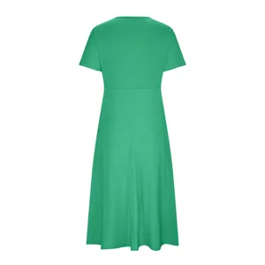 Detailed back view of a vibrant green short-sleeved A-line dress with high waistline