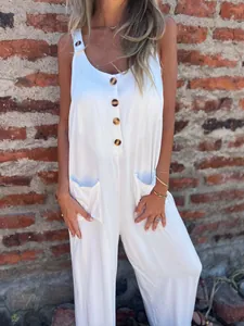 Detailed view of women's white casual sleeveless jumpsuit with buttons and pockets.