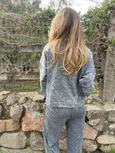 Back view of a gray acid-wash women's casual long-sleeve sweatshirt and pants set