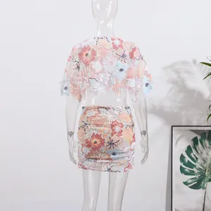 Detailed back view of luxury floral embroidered sequined two-piece set with crop top