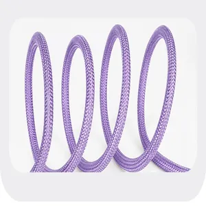 Detailed close-up showing the durable purple braided nylon texture of a small dog leash