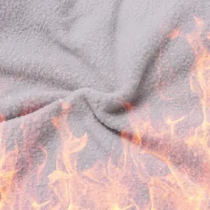 Close-up of soft grey flannel fabric for warm winter dog clothes with heat effect