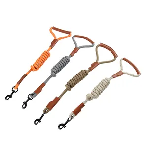 Durable braided P-rope dog leashes in four colors with leather handle and metal clips.