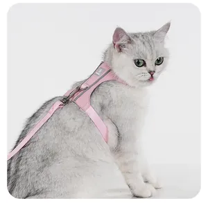 Detail of pink reflective cat harness on a grey cat with quick-dry mesh material.