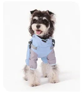 Light blue and grey waterproof four-legged pet jumpsuit jacket shown on a small dog