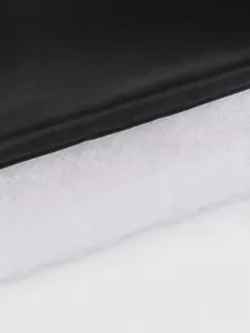 Detailed view of the 160g PP cotton padding inside a warm waterproof pet winter jacket