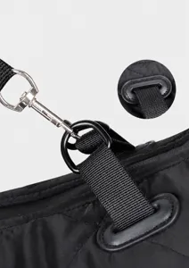 Detailed view of the reinforced leash attachment ring on a waterproof dog winter jacket.