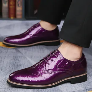 Close-up of purple crocodile-embossed patent leather dress shoes for men