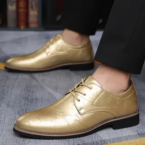 Detailed macro view of golden metallic textured lace-up business dress shoes for men