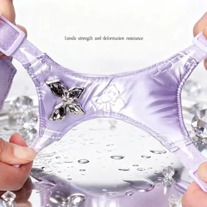 Durable purple dog harness with metal butterfly showing tensile strength and flexibility
