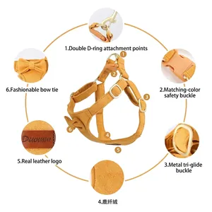 Mustard yellow suede dog vest harness featuring double D-rings, safety buckle, and cute bow