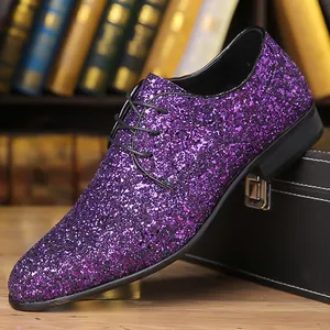 Detailed close-up view of purple glitter sequin men's lace-up dance shoes on table