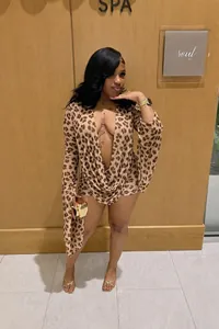 Leopard print deep V-neck mini dress for women with sexy bodycon fit for party wear