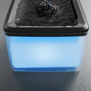 Detailed close-up of a silent pet water fountain with blue LED light and water flow